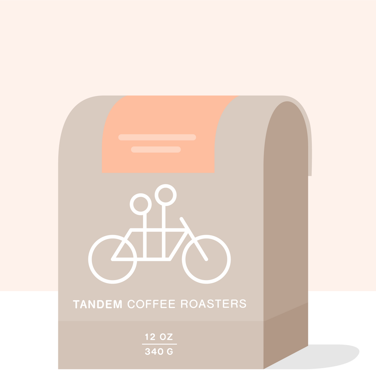 A beige coffee bag featuring a minimalist white tandem bicycle illustration is labeled “Tandem Coffee Roasters” and “Hamasho Borena - Ethiopia,” with a weight of 12 oz (340 g). A light peach accent at the top hints at the distinctiveness of this Ethiopian coffee, thoughtfully sourced from the renowned Hamasho Washing Station and crafted with anaerobic fermentation by Tandem Coffee Roasters for a unique flavor experience.