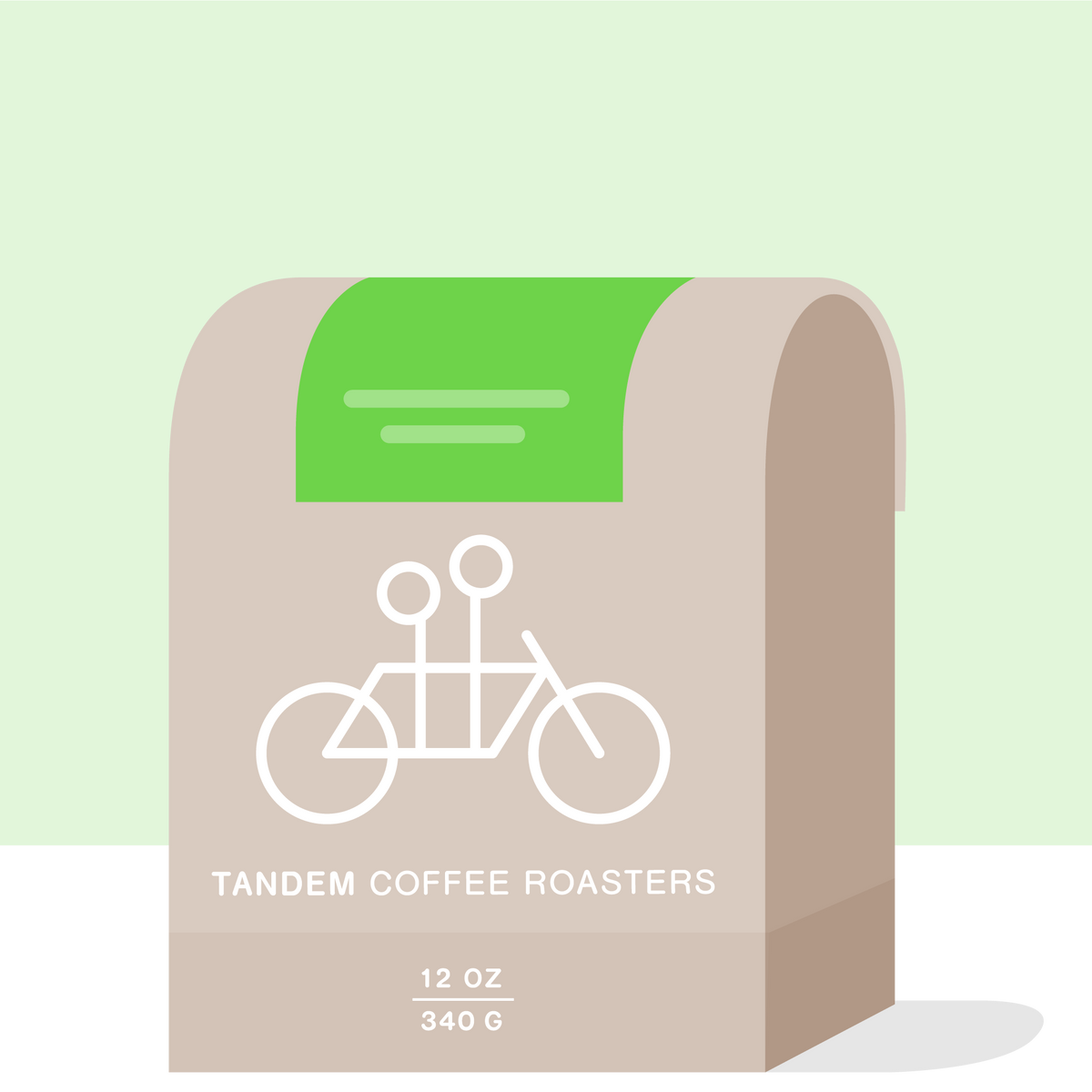 A 12 oz (340 g) beige coffee bag from Tandem Coffee Roasters, featuring a green label with a white tandem bicycle illustration and labeled "Shoondhisa Natural - Ethiopia." This bag contains natural Ethiopian coffee, renowned for its vibrant flavors and artisanal quality.